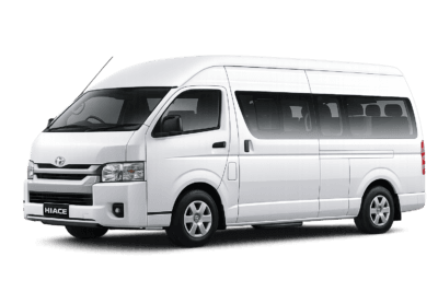 Toyota Hiace Commuter putih tampak serong depan dan samping untuk layanan sewa Hiace Bogor dengan driver profesional