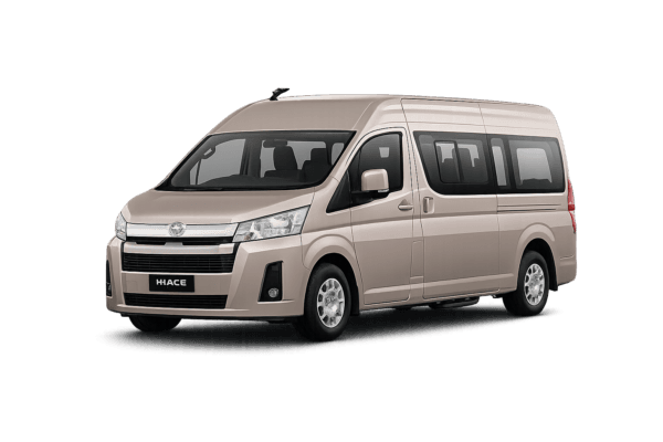 Toyota Hiace Premio coklat muda metallic tampak serong depan dan samping untuk layanan sewa Hiace Bogor dengan driver profesional